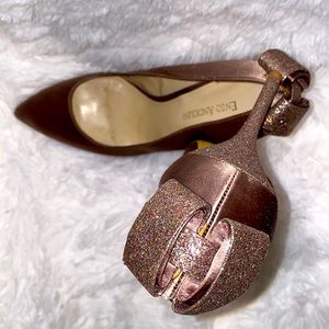 Enzo Angiolini size 10. Tan satin finish with glitter heels/sparkle bow on back